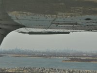 Manhattan downtown and midtown in the back.