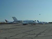 The rich guys could park on the tarmac.