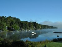 Rushford Lake on the day we had to depart. No clouds, just fog on the lake in fresh air of the early morning.
