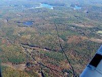 The foliage gets redder in Massachusetts. Cobble Mountain Reservoir in the back.