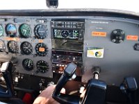 INOP means inoperational, one slot was actually empty. The plane was safe to fly, just the communications were stripped to minimum.