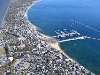 Provincetown with the piers and the Pilgrim Monument, a 252-ft tower.