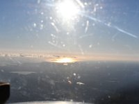 Flying into the sun on our way home.