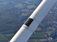 Flying at 6500 feet was high enough to create some ice on hte black surface.